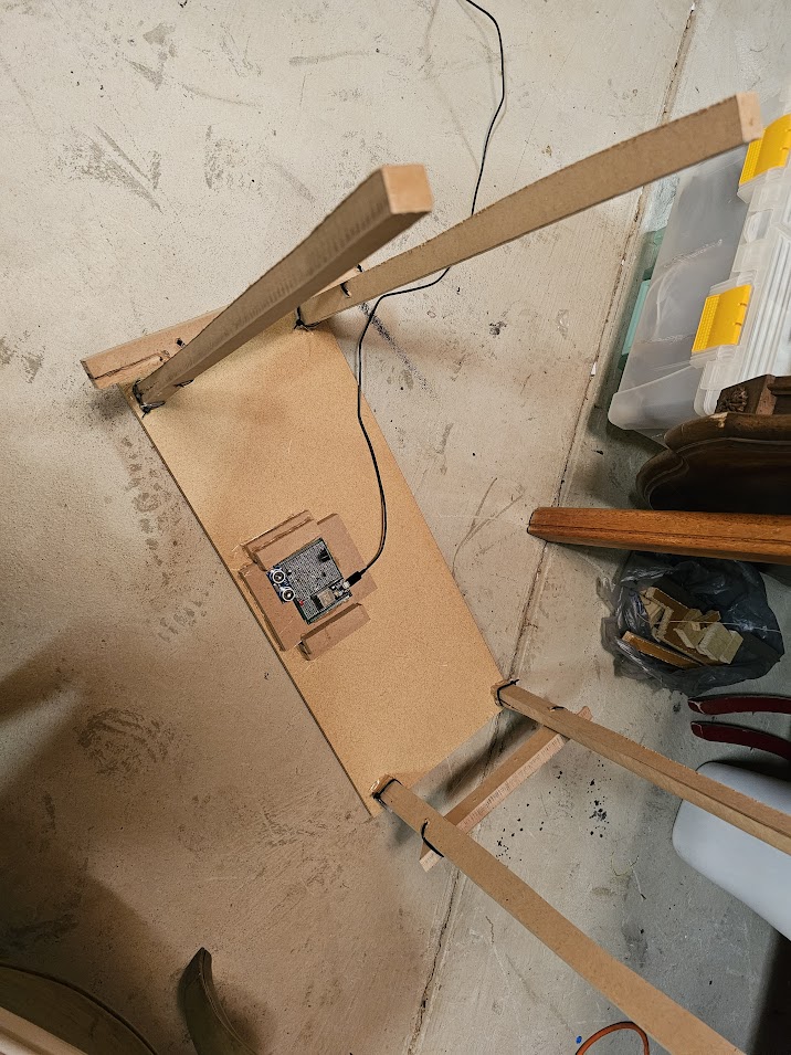 ESP32 server mounted underneath a test desk